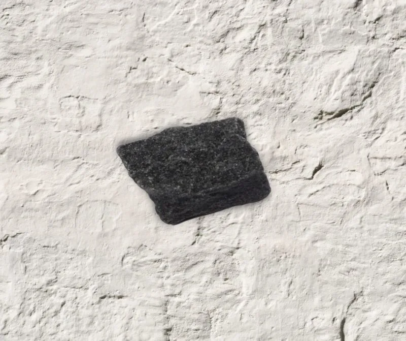 black azezlutite on concete