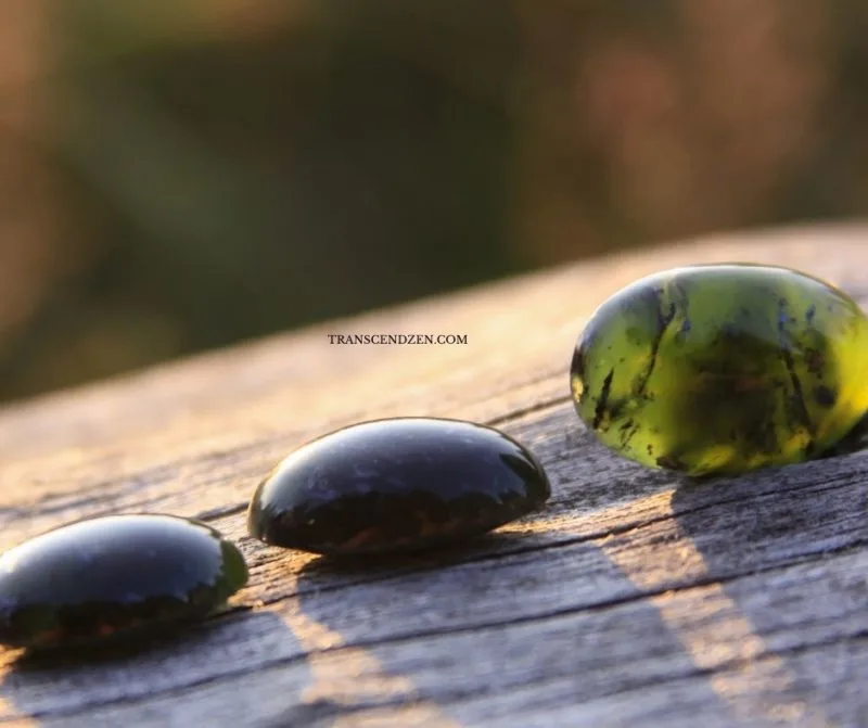 3 black jade on wood