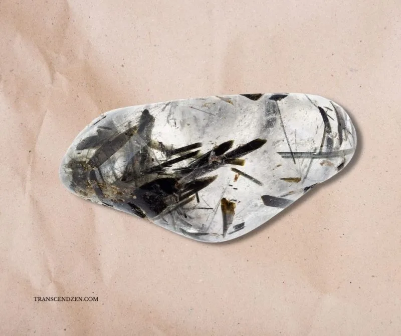 tourmalinated quartz on pink paper
