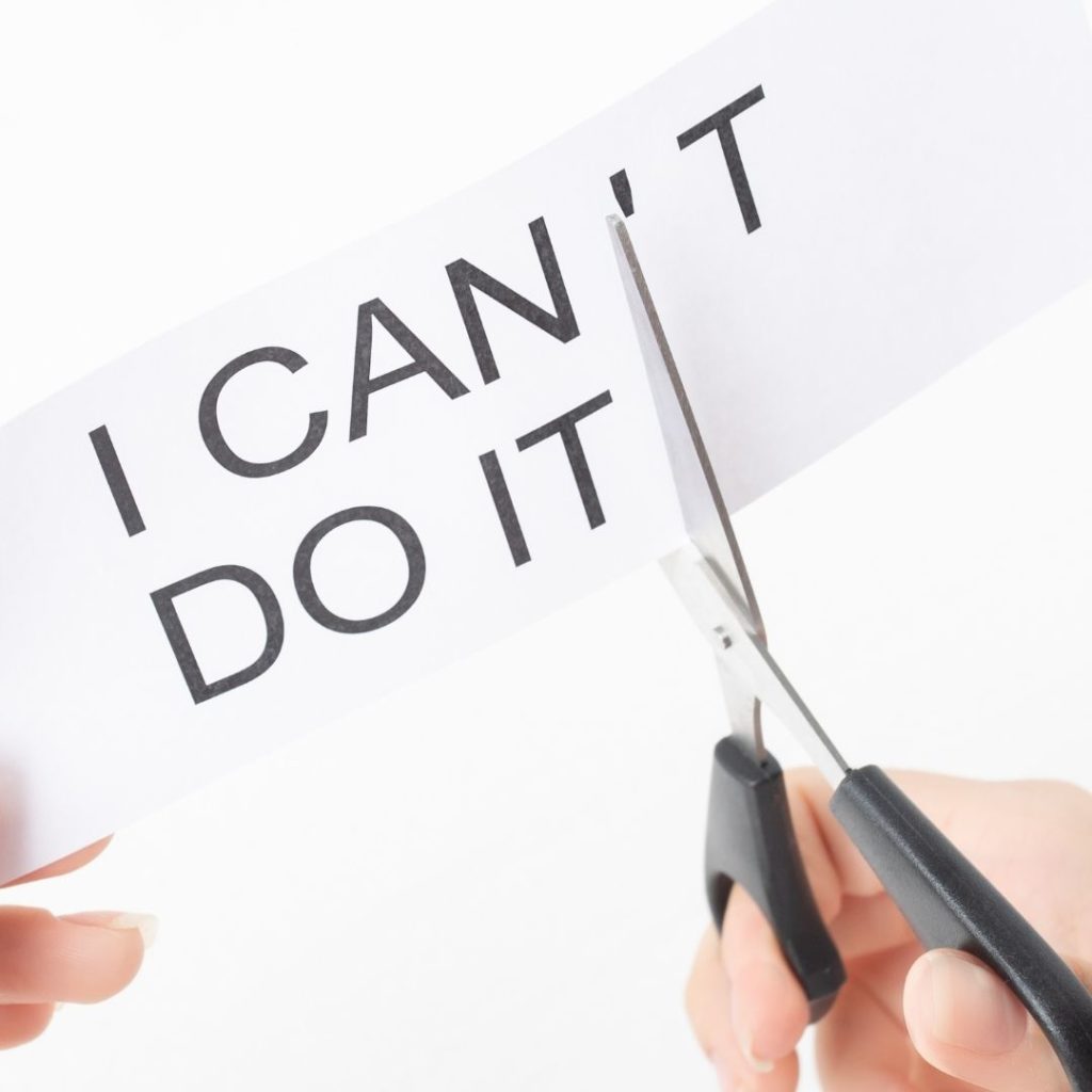 cutting the "t" or limiting beliefs out of "I can't" on paper