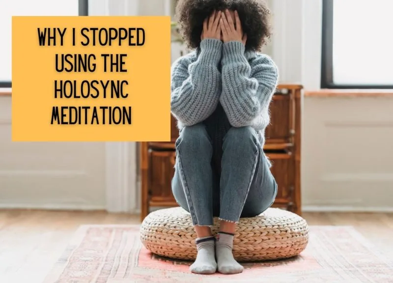 girl covering face on meditation pillow
