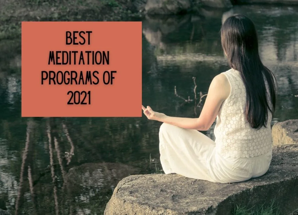 woman meditating near river