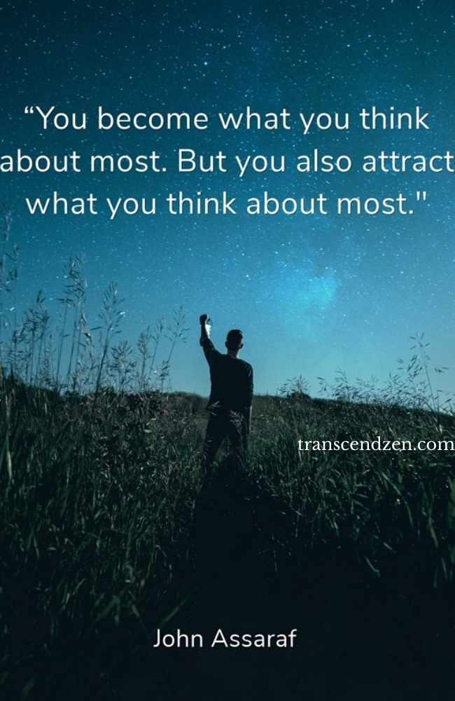 Man outside in night with law of attraction quote